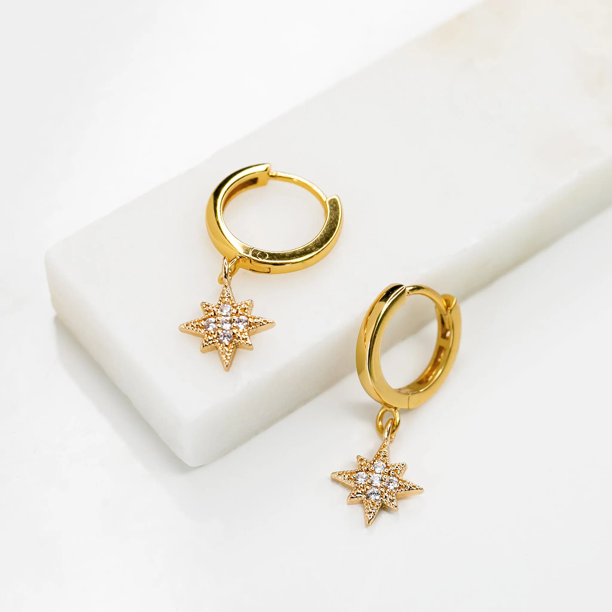 Twinkling Pavé Star Huggie Earrings