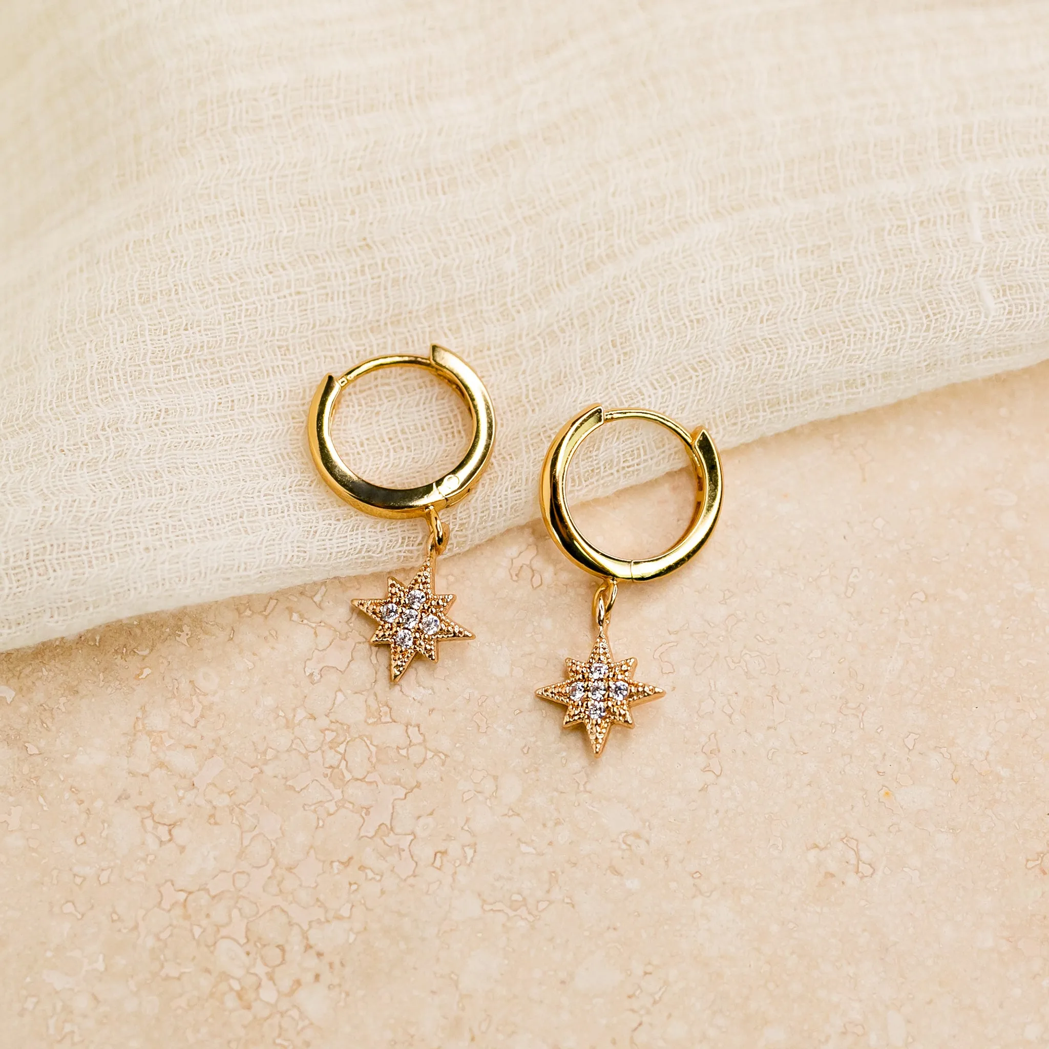 Twinkling Pavé Star Huggie Earrings