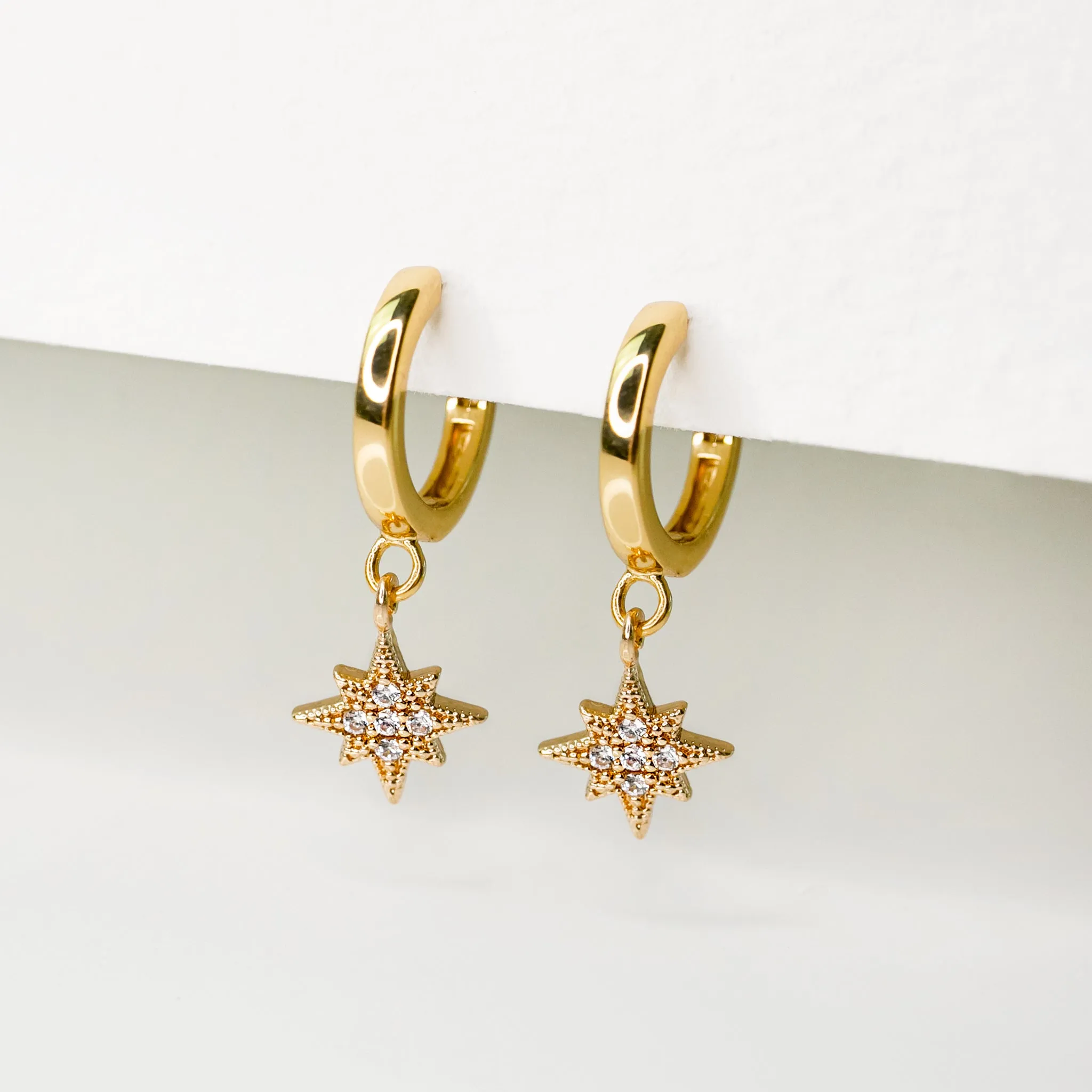 Twinkling Pavé Star Huggie Earrings