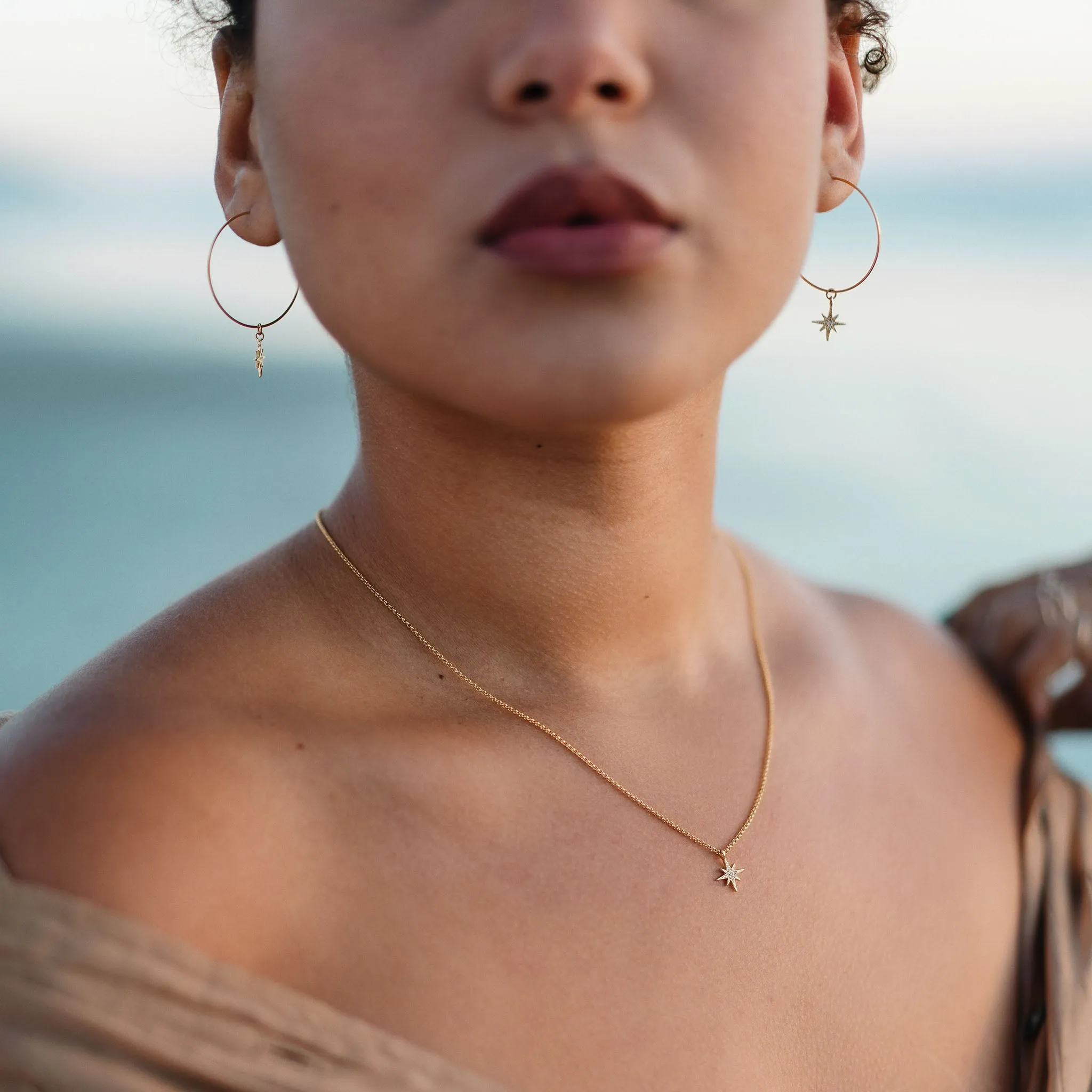 Twinkling Pavé Star Weightless Hoop Earrings