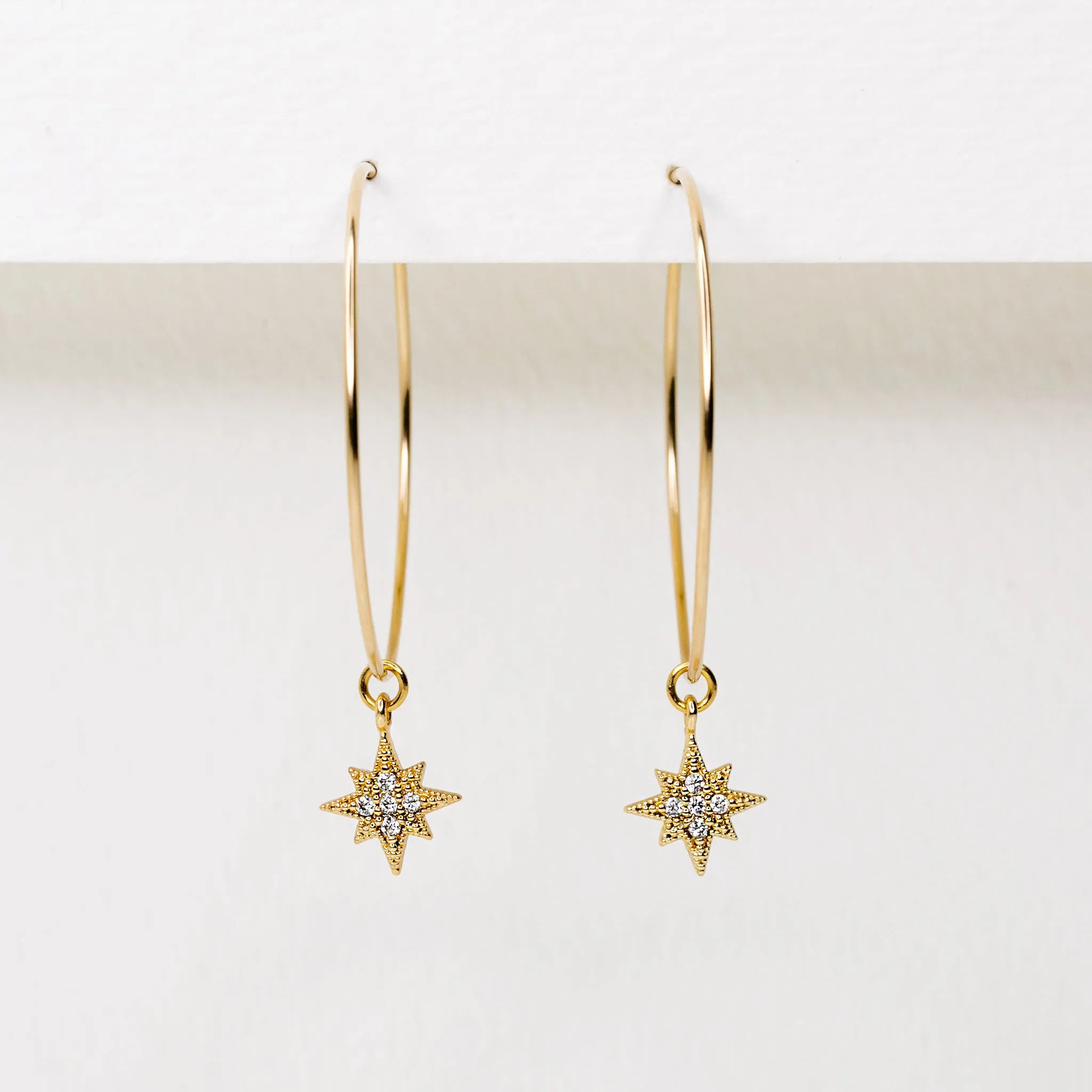 Twinkling Pavé Star Weightless Hoop Earrings